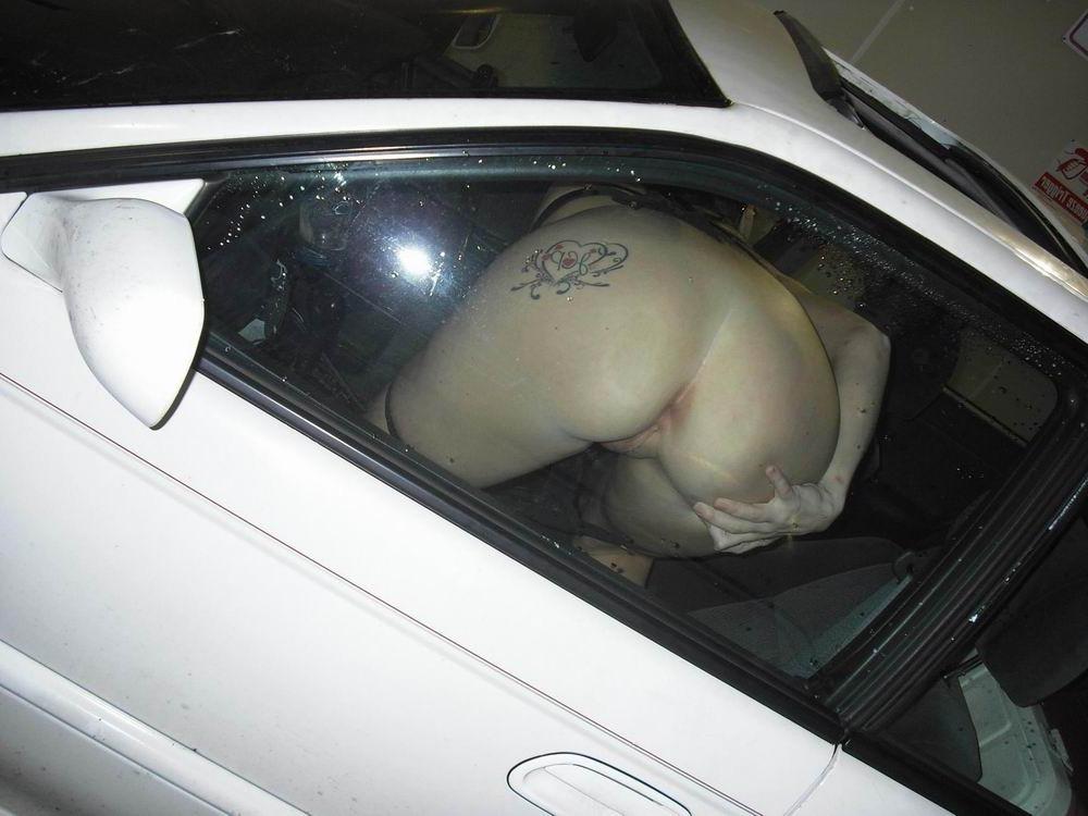 18P cute brunette teen showing off in the car