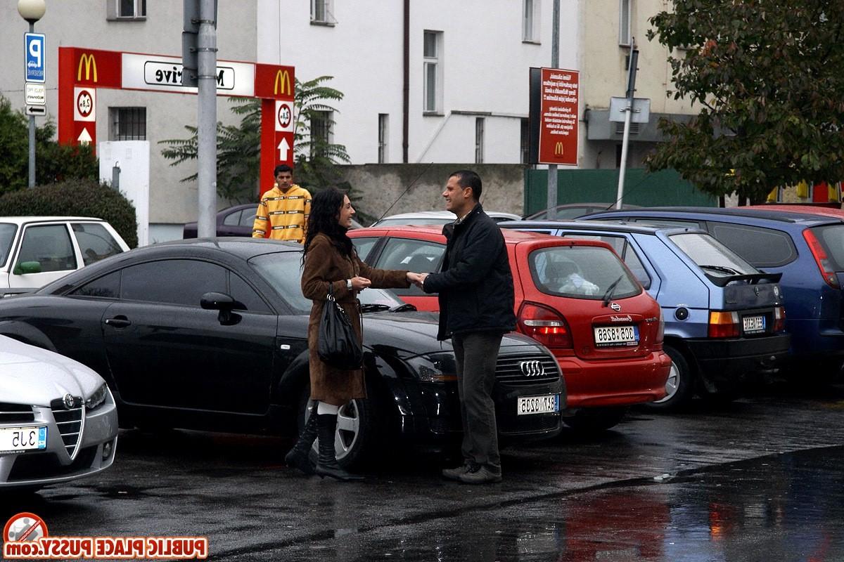 14P Sexy willing brunette is sucking his erect dick in public