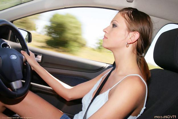 15P Cute brunette flashes her pretty bits at car wash