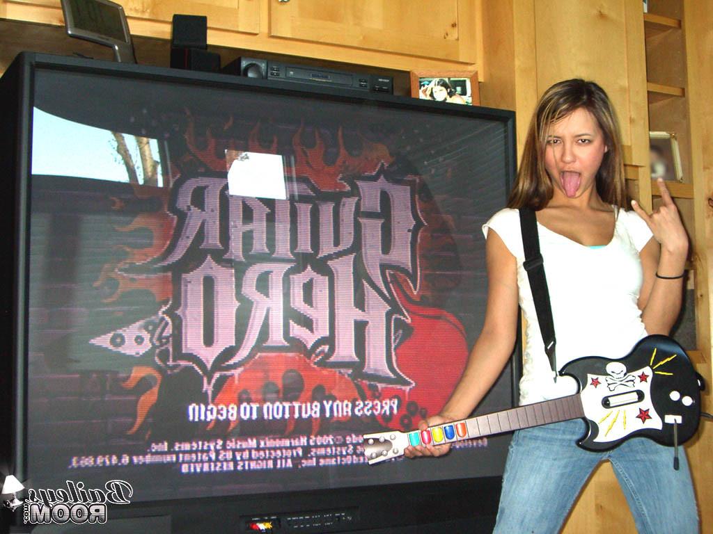 15P Sexy teen gets comfortable playing a video game