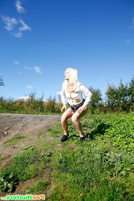 16P Blonde cutie tinkles on the shoulder of country road