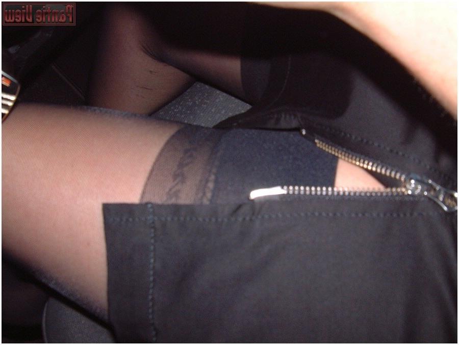 15P While driving here car this girl is showing here black stockings