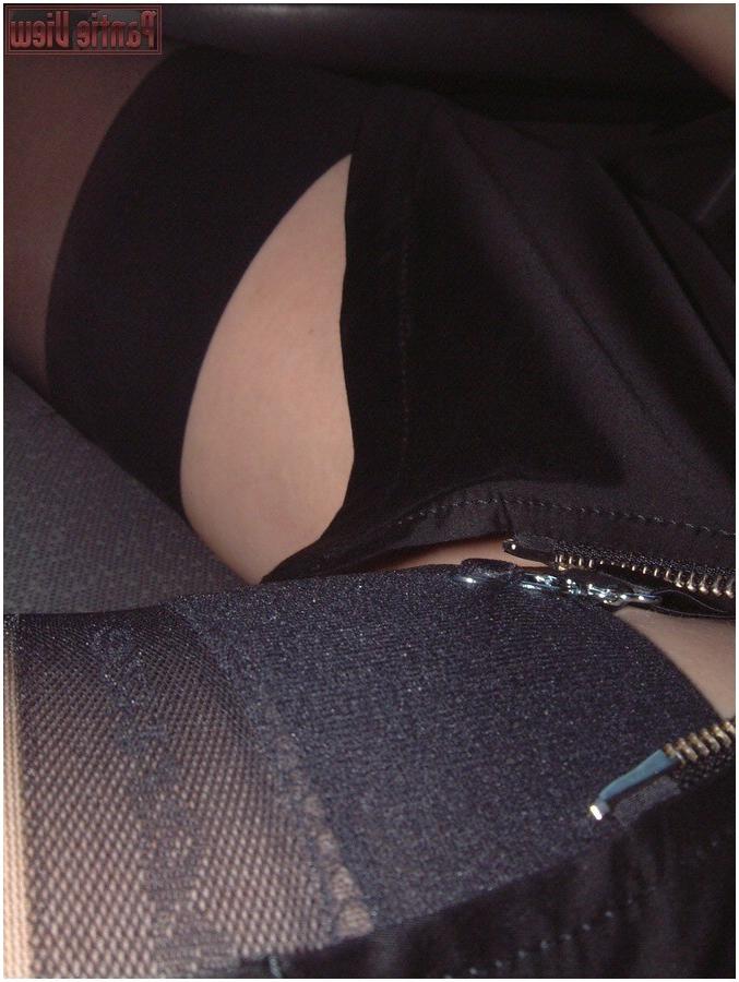 15P While driving here car this girl is showing here black stockings
