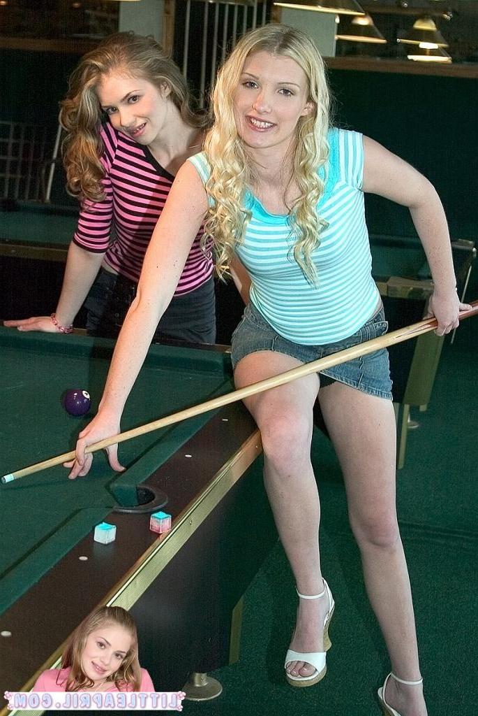 16P Two hot teens playing a hot game of pool together