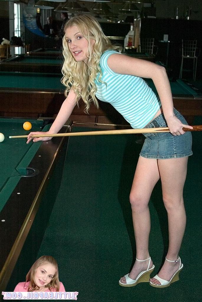 16P Two hot teens playing a hot game of pool together