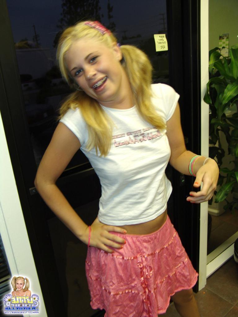 16P Blonde teen in a car teasing and flashing panties