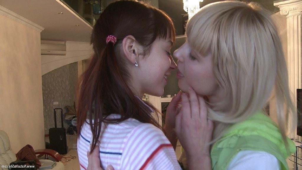 15P Two beautiful young lezzies teasing
