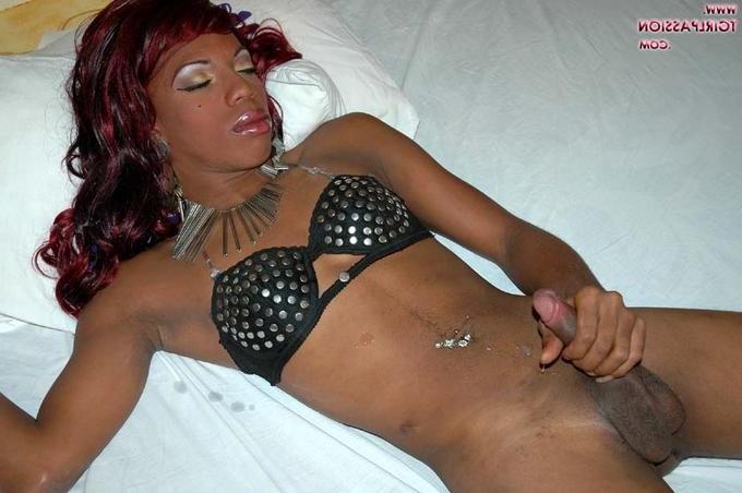 4P Dominican tranny stroking her huge black shecock