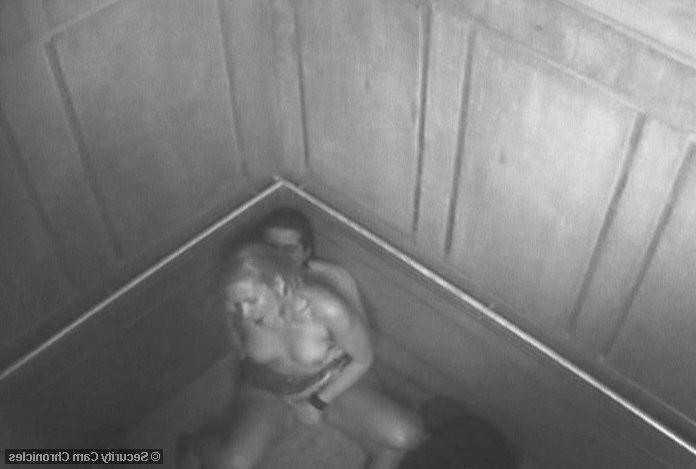 16P Horny couple caught in action by hidden elevator cam