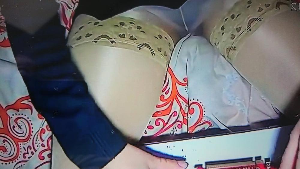 25P Housewife in stockings arround the house.