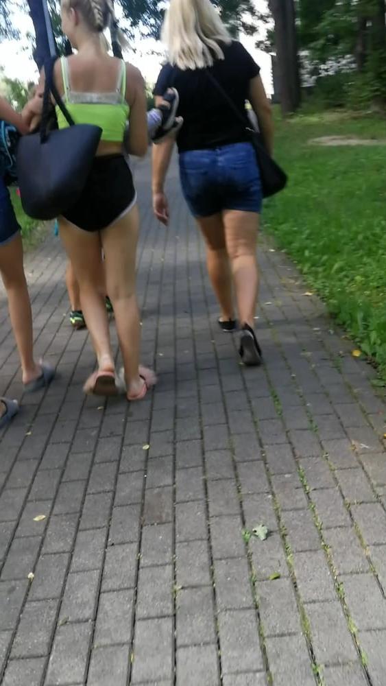 12P Sexy ass of young blonde teen wearing shorts