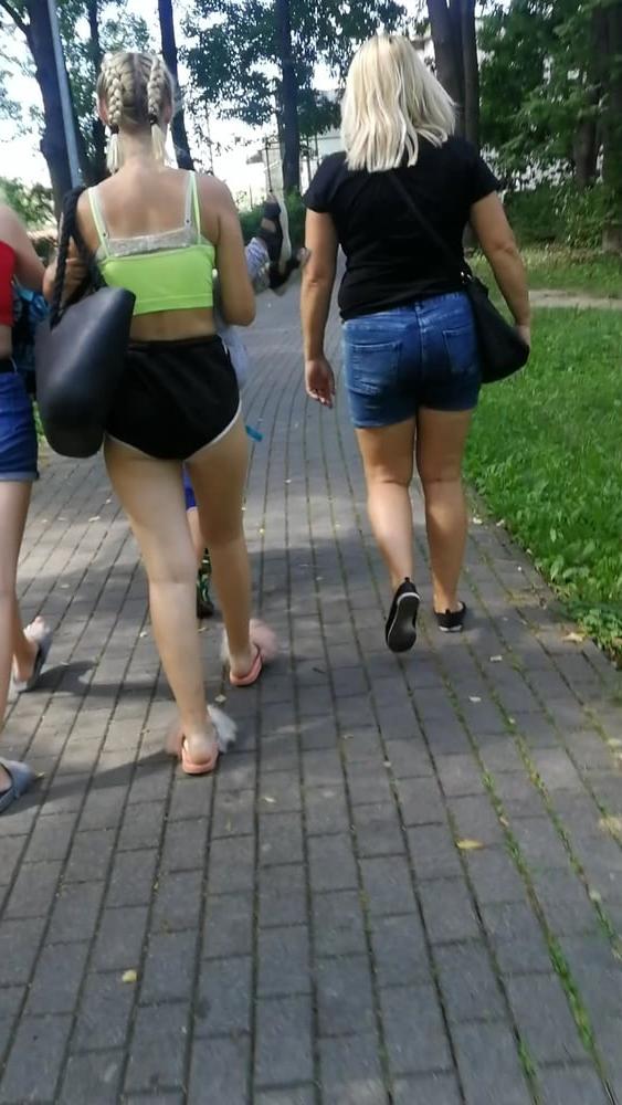12P Sexy ass of young blonde teen wearing shorts