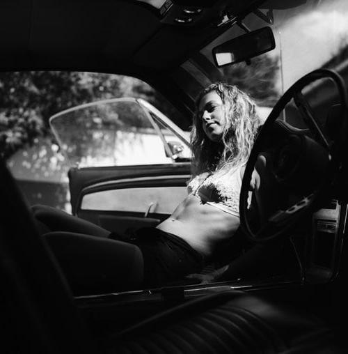 25P A girl in a car