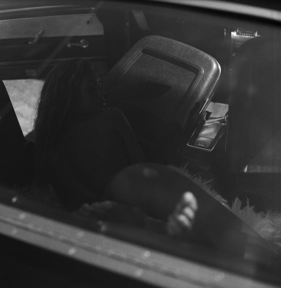 25P A girl in a car