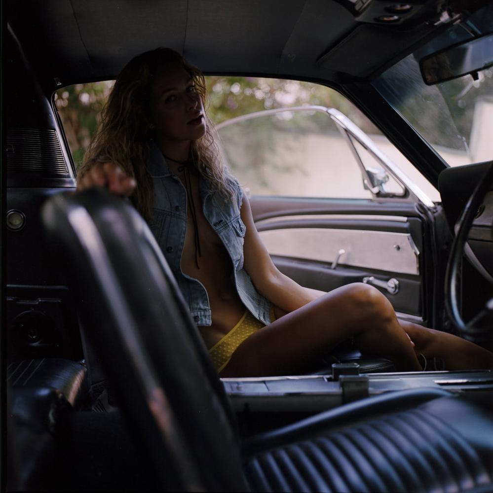 25P A girl in a car