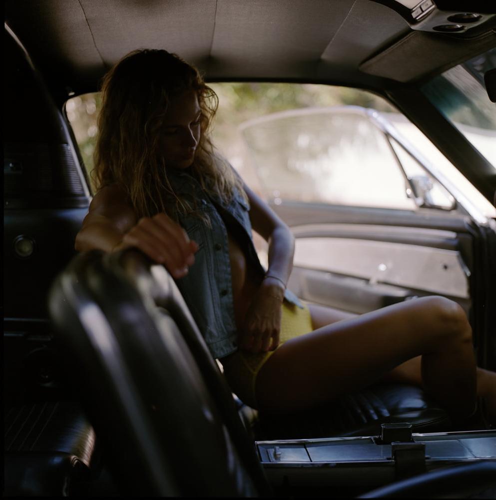 25P A girl in a car