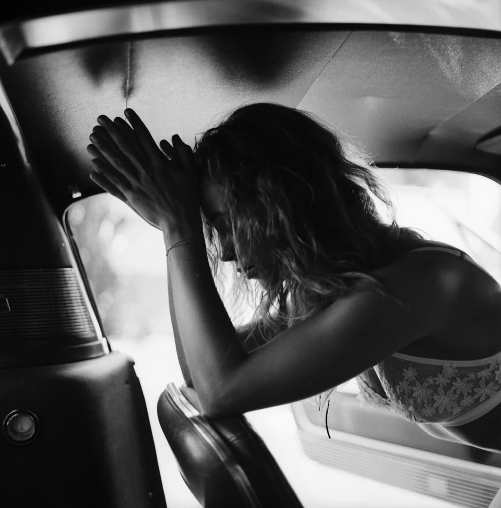 25P A girl in a car