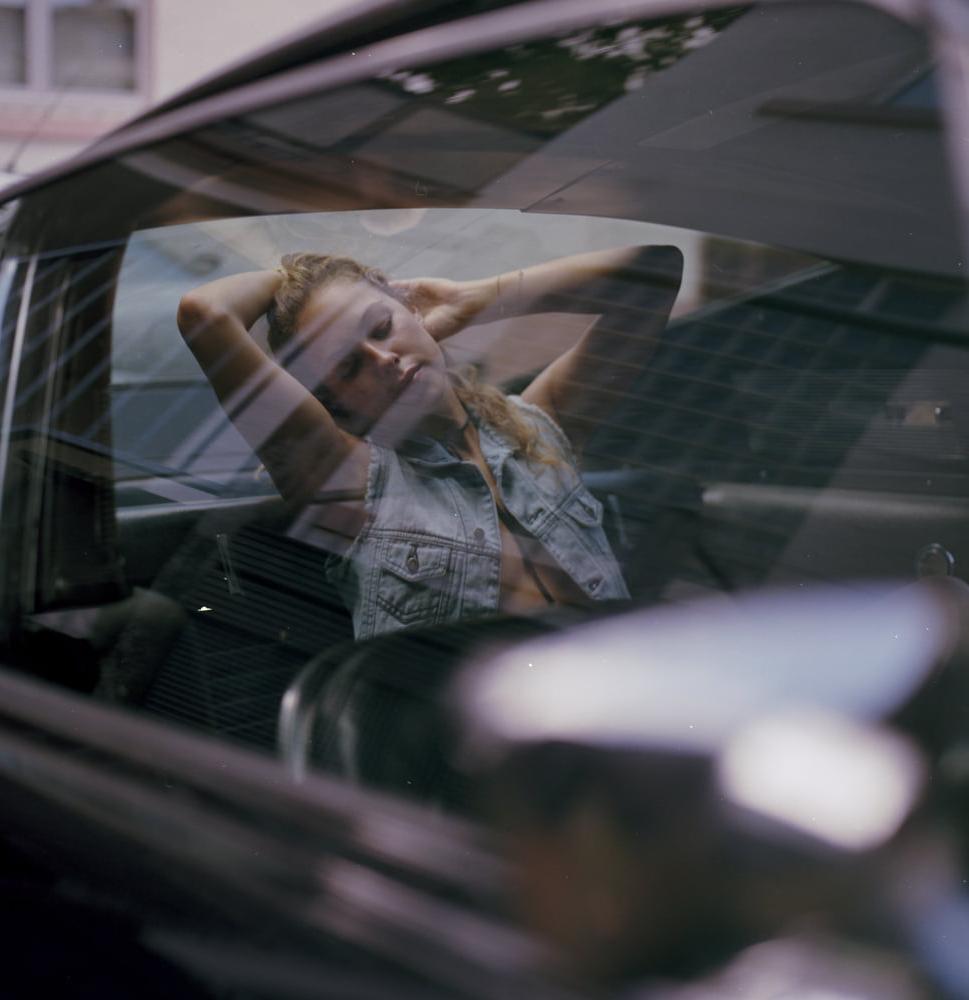 25P A girl in a car