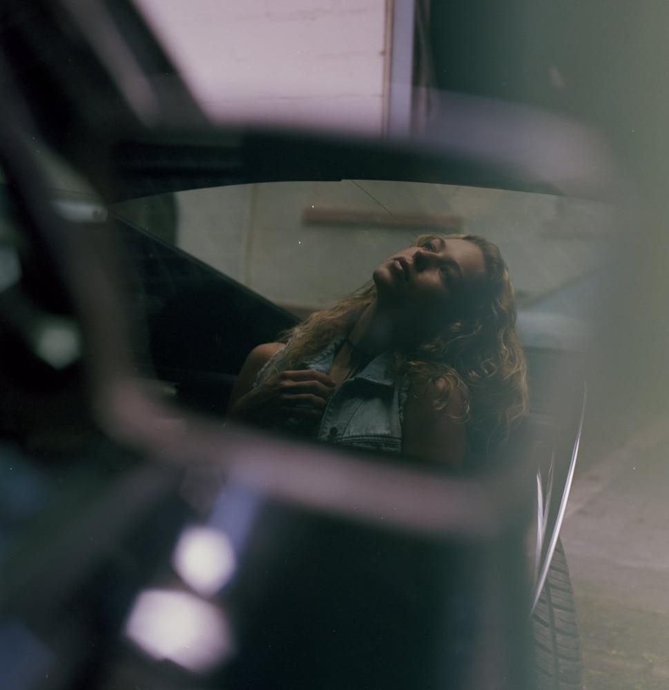 25P A girl in a car