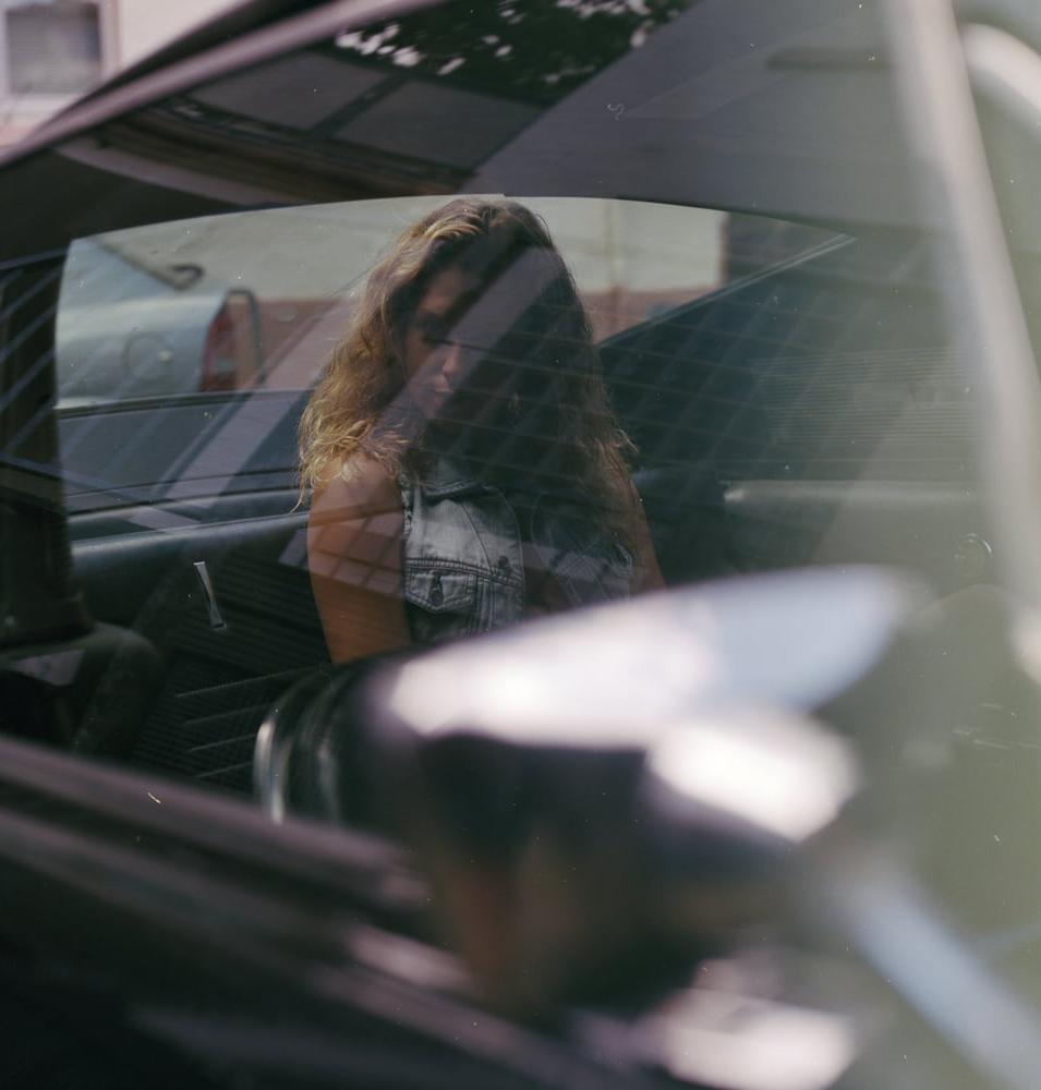 25P A girl in a car