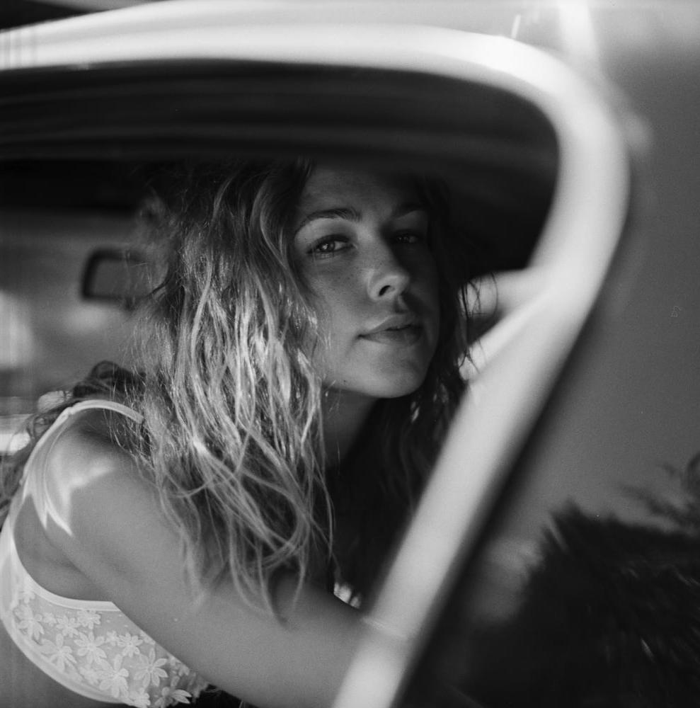 25P A girl in a car