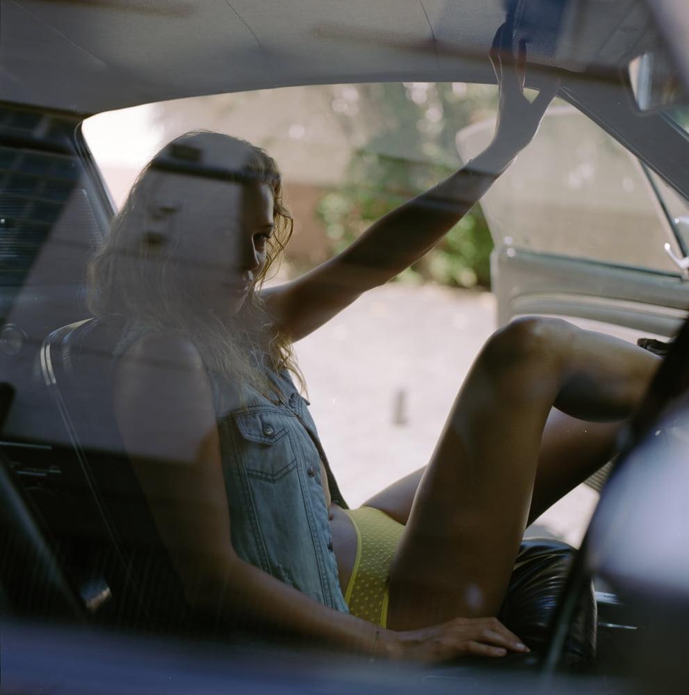 25P A girl in a car