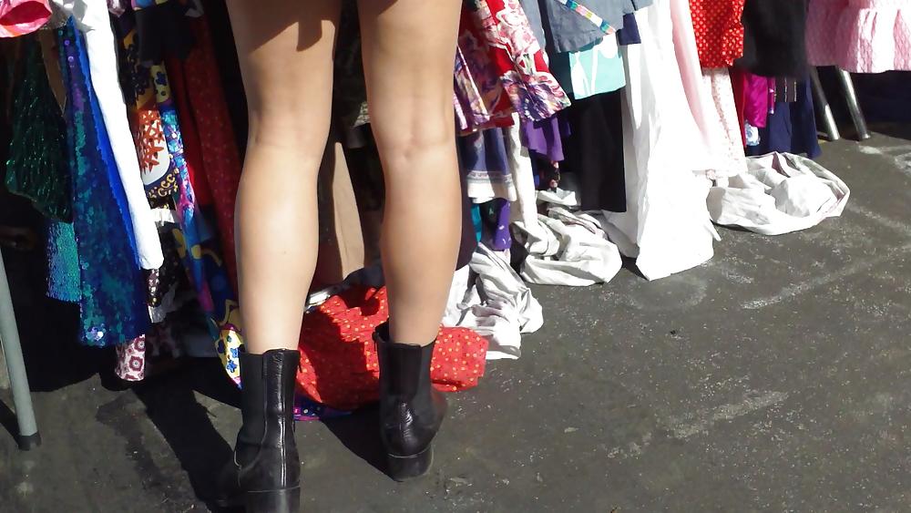 25P Hot teen girl in short black skirt with nice legs