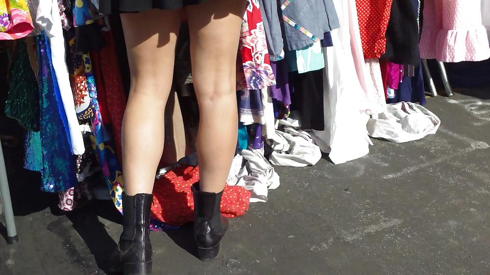 25P Hot teen girl in short black skirt with nice legs