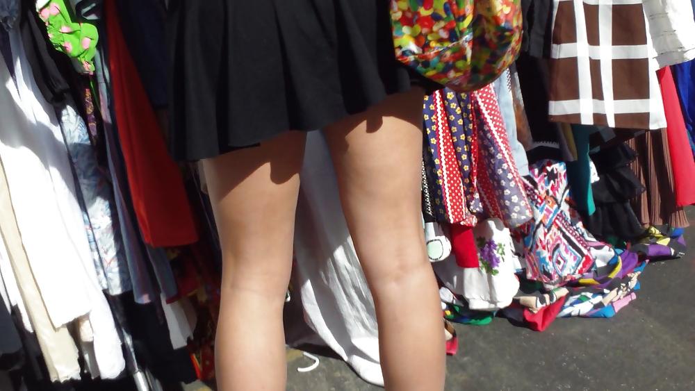 25P Hot teen girl in short black skirt with nice legs