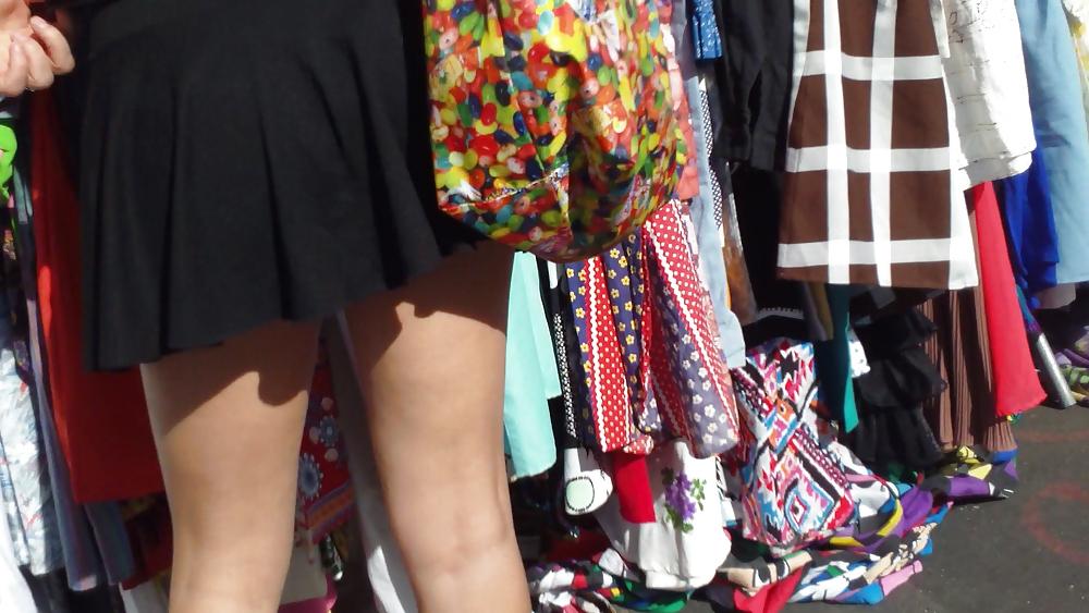 25P Hot teen girl in short black skirt with nice legs