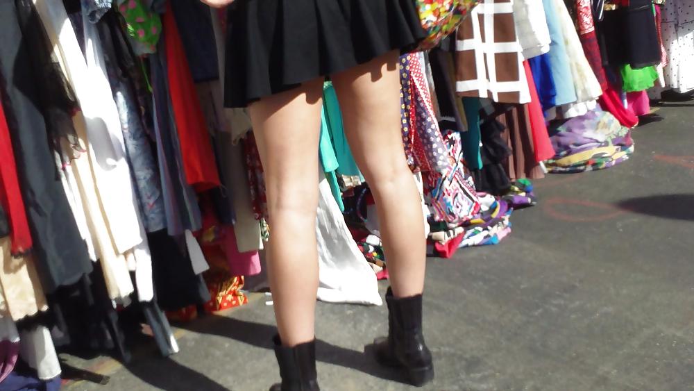 25P Hot teen girl in short black skirt with nice legs