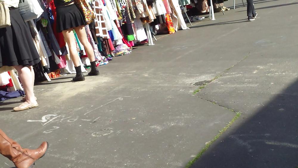25P Hot teen girl in short black skirt with nice legs