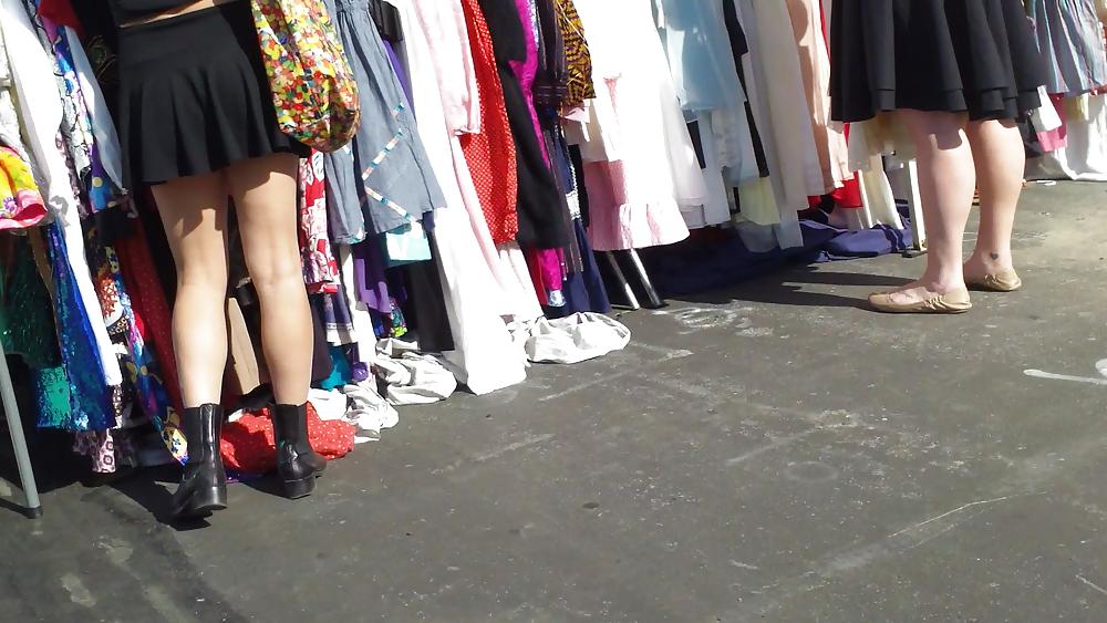 25P Hot teen girl in short black skirt with nice legs