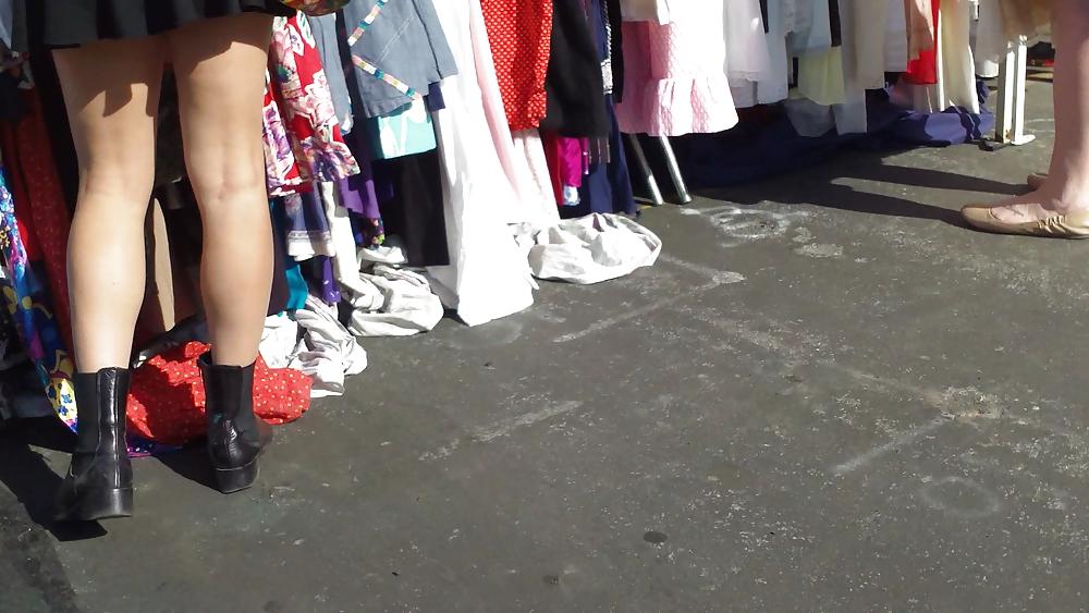 25P Hot teen girl in short black skirt with nice legs