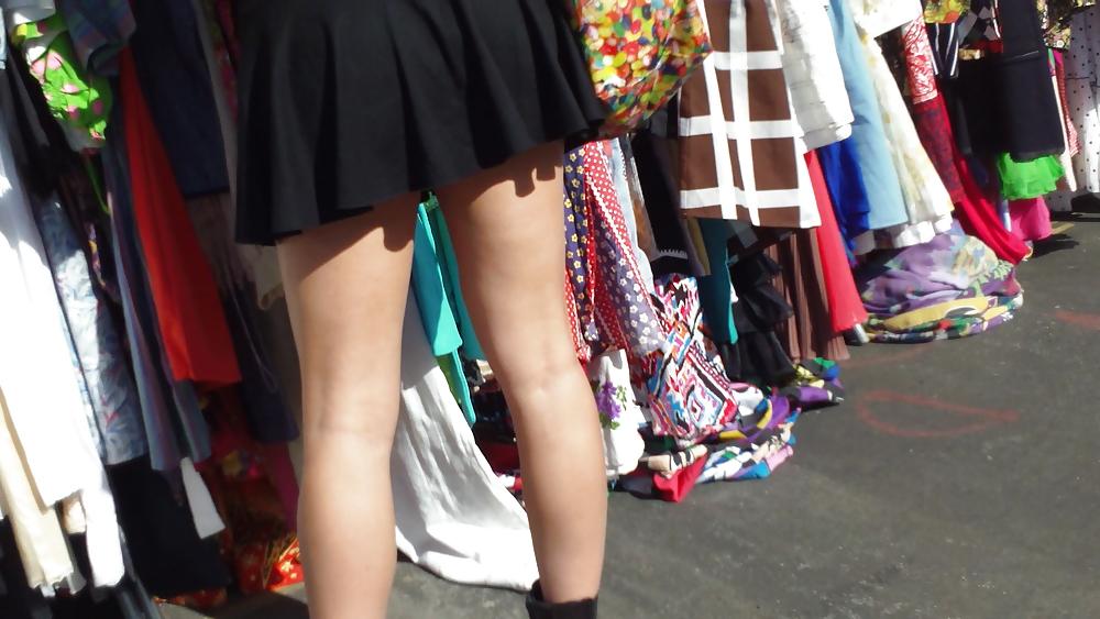 25P Hot teen girl in short black skirt with nice legs