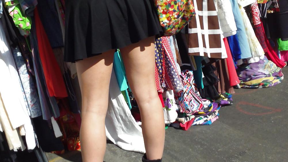 25P Hot teen girl in short black skirt with nice legs