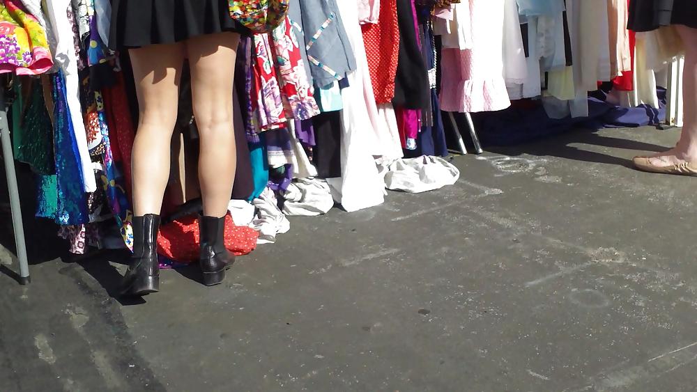 25P Hot teen girl in short black skirt with nice legs