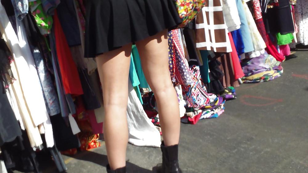 25P Hot teen girl in short black skirt with nice legs