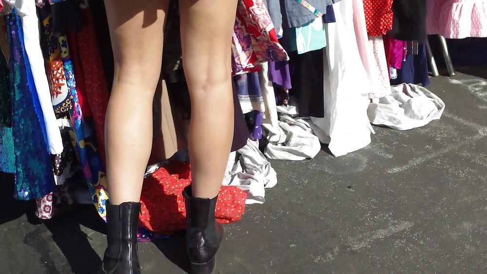 25P Hot teen girl in short black skirt with nice legs