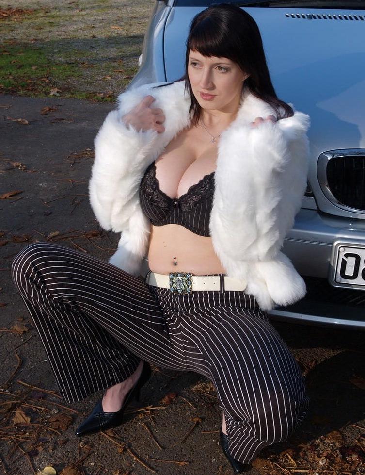 16P Busty babe topless is car