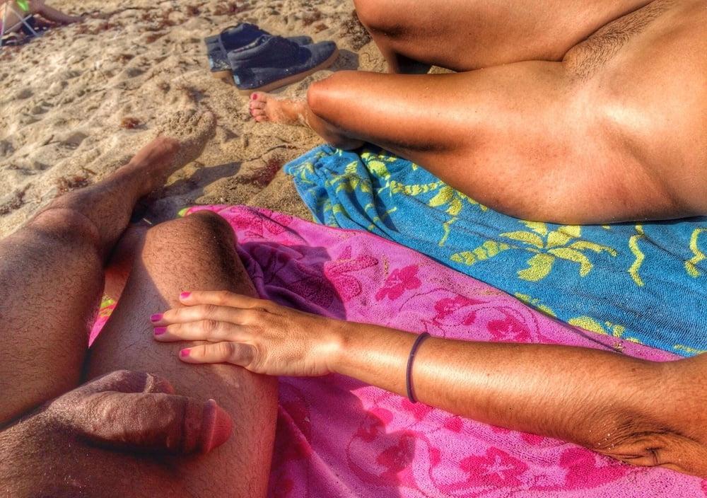 25P 0789  Nude beach couple and caress.