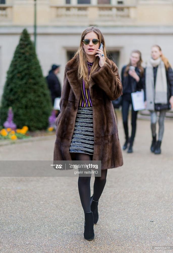 25P woman in fur coat 26