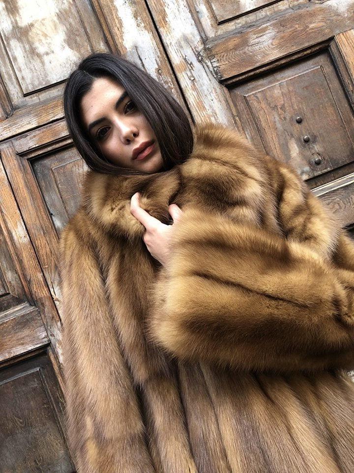 25P woman in fur coat 26