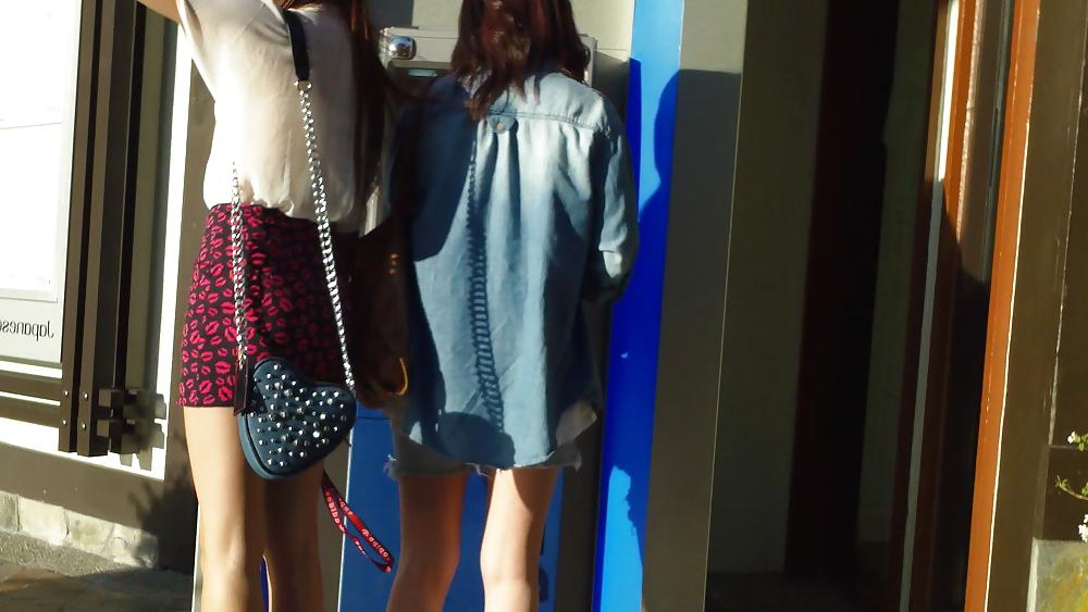 25P Hot teen girl in red dress with great legs