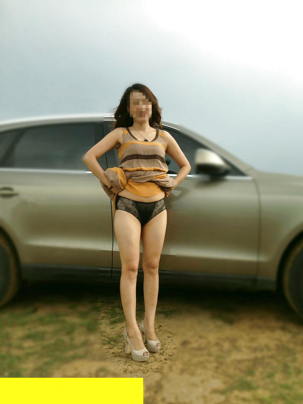 15P Friend's chinese wife flashing in public