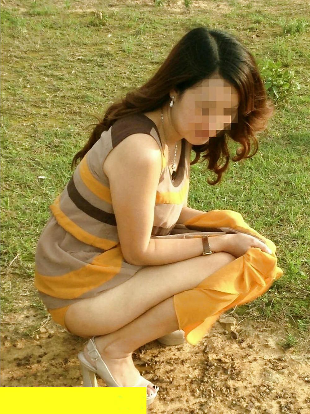 15P Friend's chinese wife flashing in public