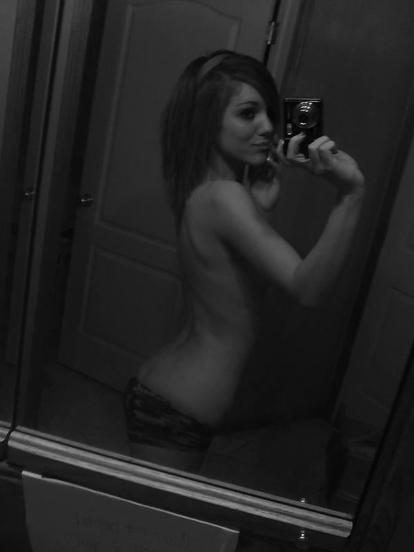 7P Skinny petite young girl in camoflage selfshots