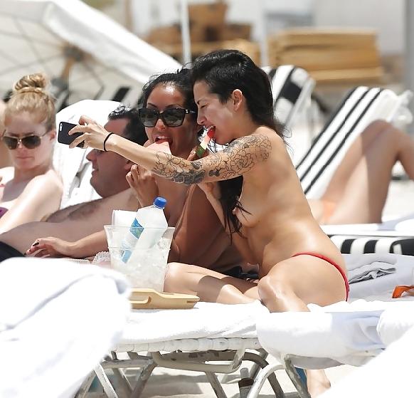 14P Kiara Mia and Her Friend Topless on the Beach in Miami