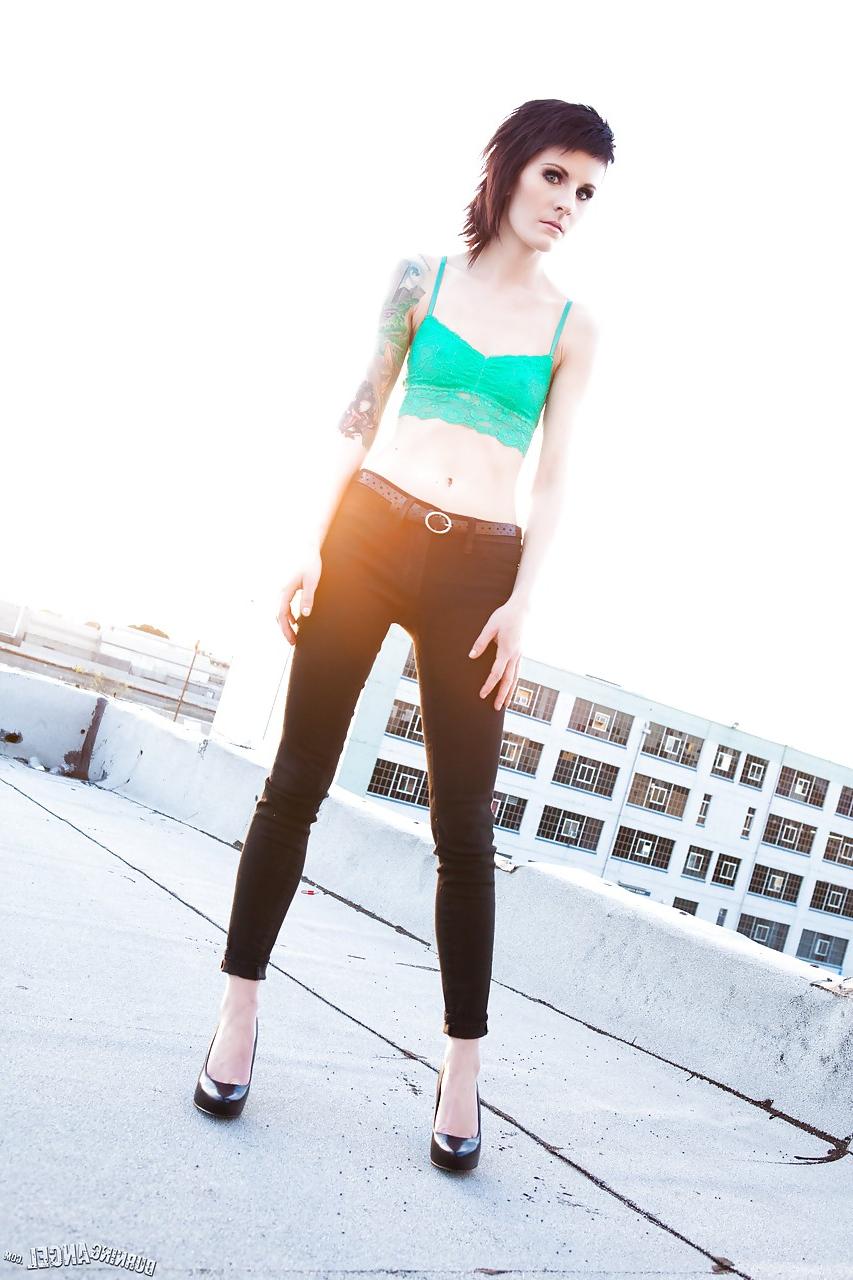 15P Skinny alt babe with tattooed body exposing tiny tits outdoors on rooftop