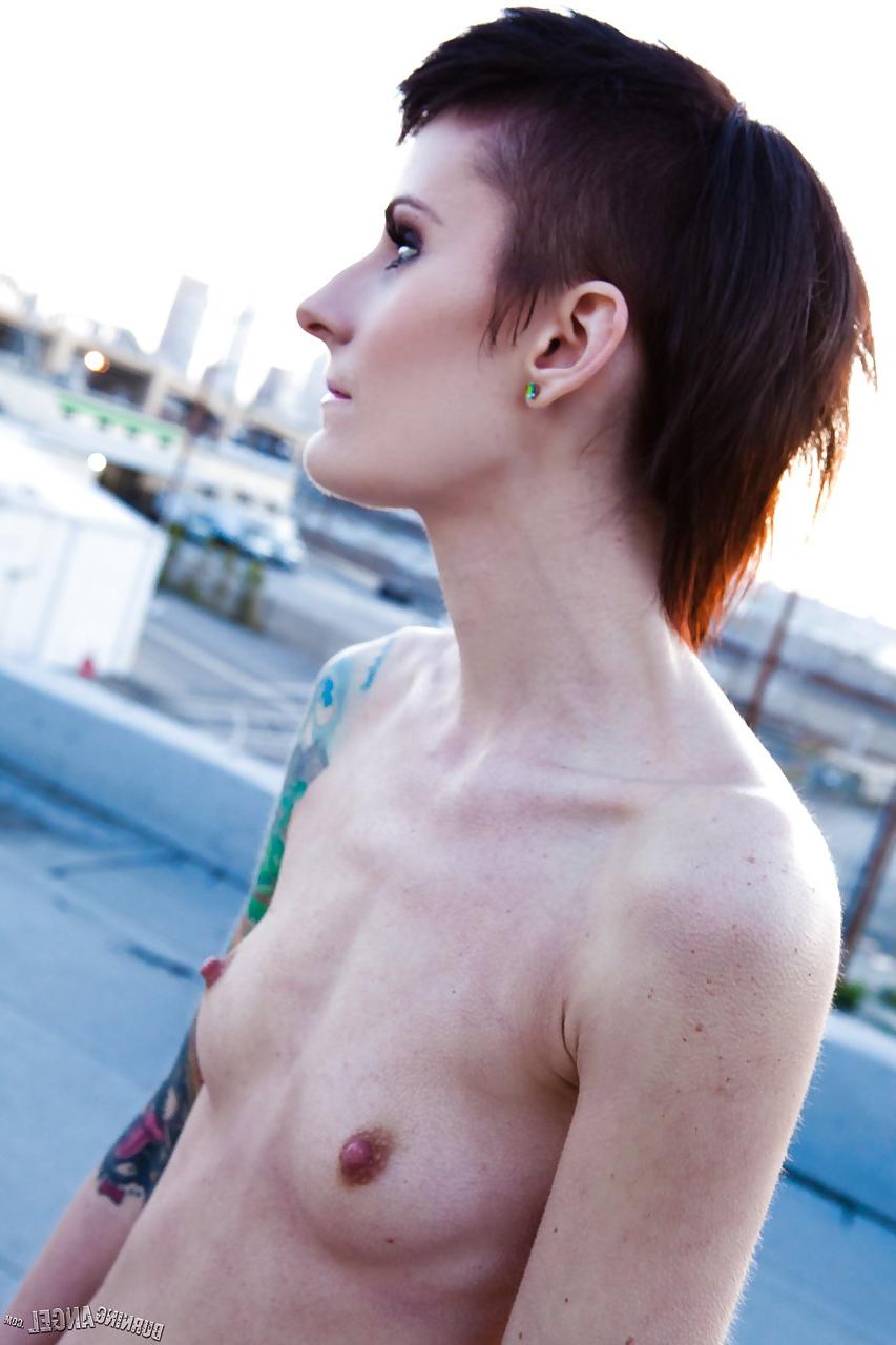 15P Skinny alt babe with tattooed body exposing tiny tits outdoors on rooftop